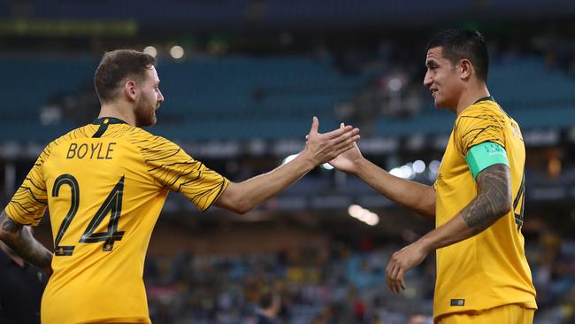 Martin Boyle is congratulated by Tim Cahill after his two-goal show.