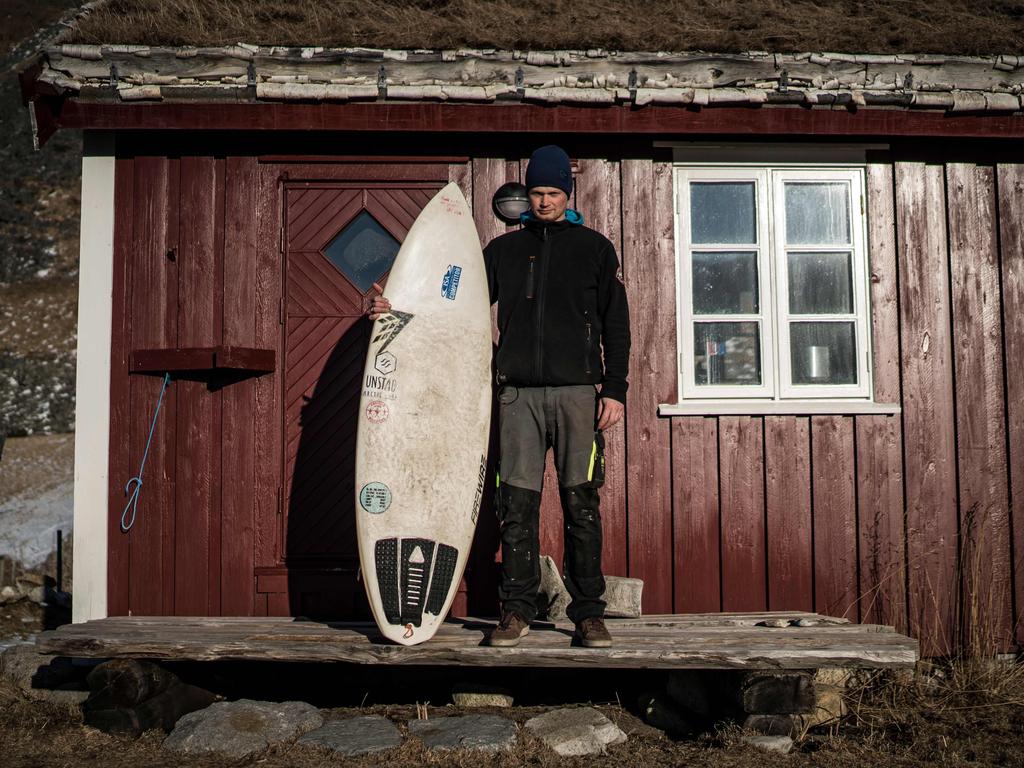 Ole Kristian Fjelltun-Larsen, 34, a coffeeshop and B&B owner, poses on March 8, 2018, in Unstad, northern Norway, Lofoten islands, within Arctic Circle. Ole Kristian Fjelltun-Larsen, 34, coffeeshop B&B owner “Surfing to me is relaxing and good exercise. The weather doesn’t bother me that much. When it’s warm, it’s very different. Winter is more challenging, it’s like an extreme form of meditation, with an extreme contact with nature. In winter, you get very tired physically, the body uses a lot of energy to keep warm, but your head gets really relaxed, you forget about stuff, you calm down and big problems become smaller problems. The feeling when you’re done is really good. You rush to the beach in your car to get there, you drive too fast and when you home, you’re driving too slow”. Picture: AFP