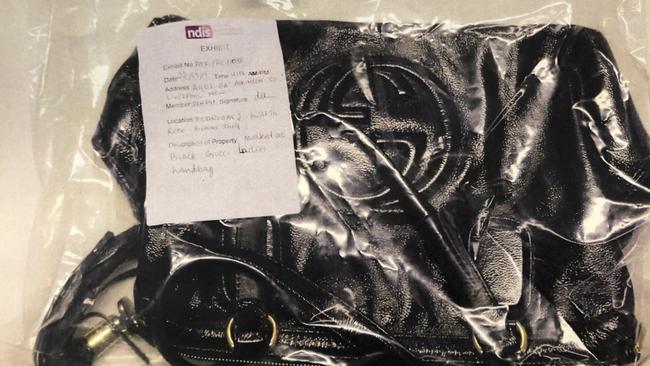 A black Gucci handbag seized by AFP during raids on the NDIS syndicate.