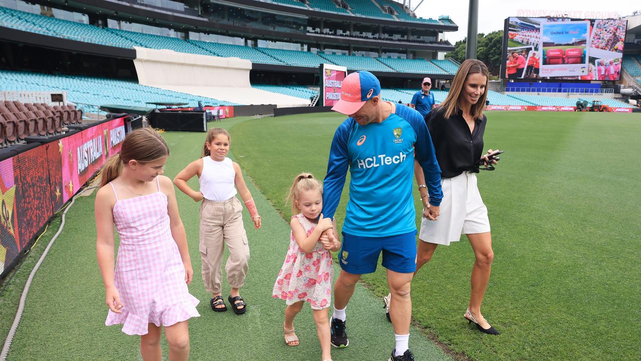 David Warner leaves a press conference with his daughters and wife Candice ahead of his final Test. Picture: Mark Evans/Getty Images.