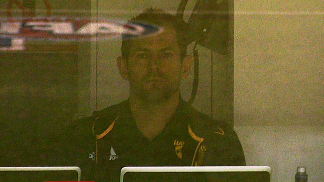 Luke Hodge looks on from the coaches box.