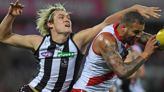 Darcy Moore in action against Sydney before being injured.