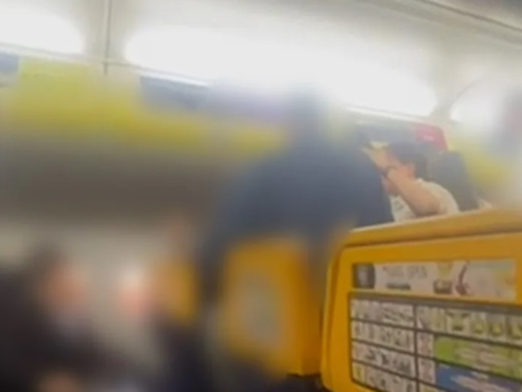 The disgraced passengers were caught on camera in the midst of their fight.