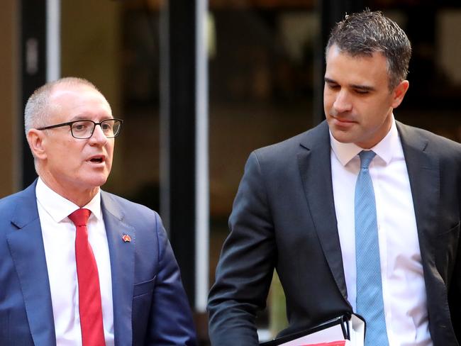 South Australian Premier Jay Weatherill (left) and Minister for Health Peter Malinauskas arrive at a media conference to announce a Mental Health policy in Adelaide, Tuesday, February 27, 2018. (AAP Image/Kelly Barnes) NO ARCHIVING