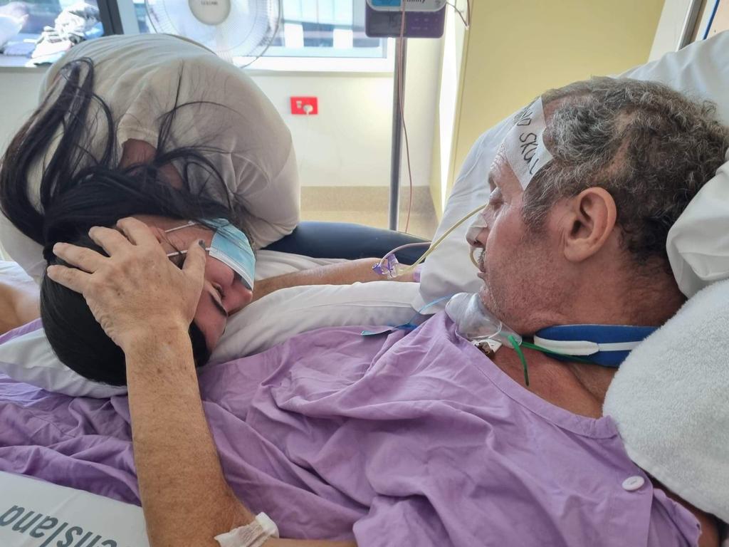 The father-of-five has a long recovery ahead with another operation to replace the skull piece that was removed to let the brain swell outside of the skull. Picture: Supplied