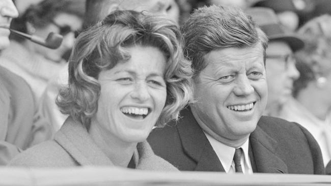 President John F. Kennedy and his sister, Jean Kennedy Smith, watch an opening day baseball game at Griffith Stadium in Washington in 1961.