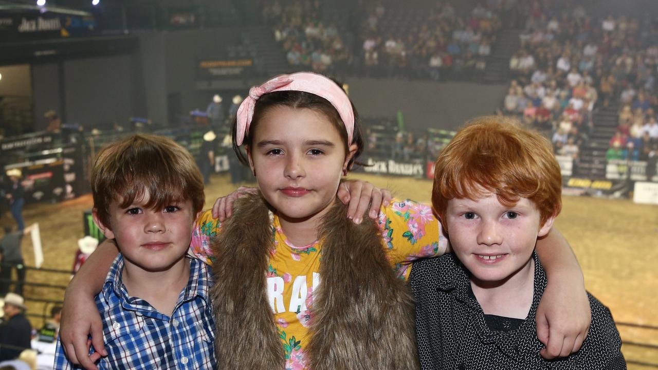 The PBR Cairns Invitational was held at the Cairns Convention Centre on Saturday, June 15. Dustin Lanskey, 6, Mackenzie Lavis, 7, and Jaydon Lanskey, 8, enjoyed the bull riding. PICTURE: BRENDAN RADKE