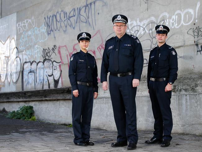 Victoria Police Chief Commissioner Graham Ashton with Senior Constable Yasemin Dincer and Constable Justin Baido. Picture: Andrew Tauber