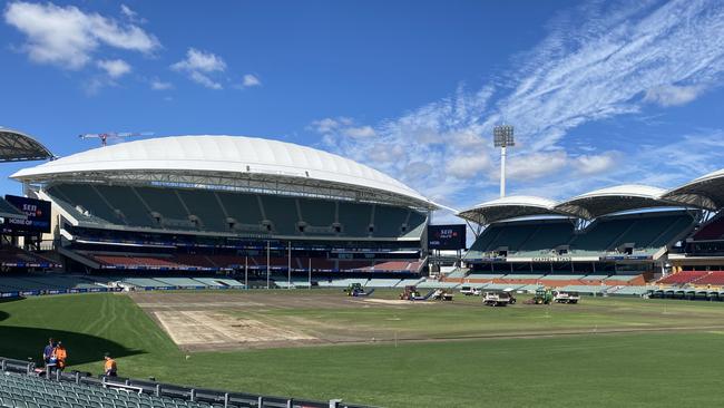 The turf on Adelaide Oval is being ripped up after Ed Sheeran’s concert on Tuesday night. Picture: Eva Blandis.