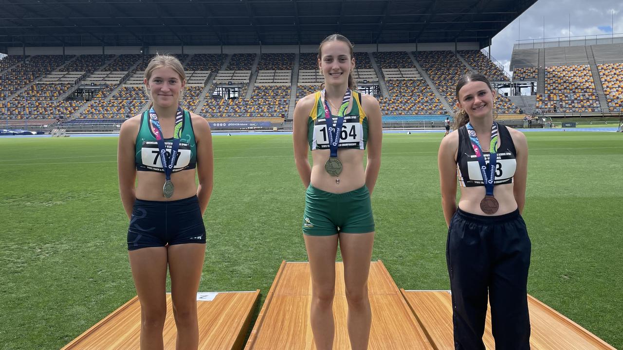 Smiling medallists from the track and field championships.