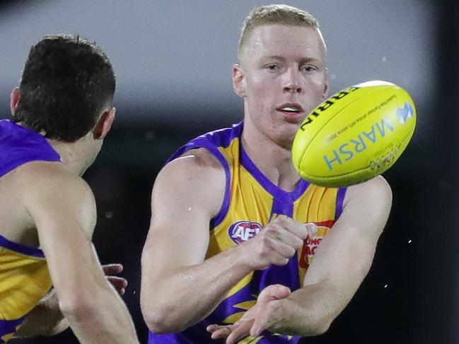 PERTH, AUSTRALIA - FEBRUARY 27: Bailey Williams of the Eagles handpasses the ball during the 2020 Marsh Community Series match between the West Coast Eagles and the Essendon Bombers at Mineral Resources Park on February 27, 2020 in Perth, Australia. (Photo by Will Russell/AFL Photos via Getty Images)