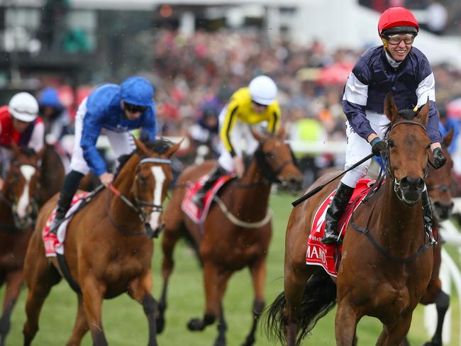 Almandin, ridden by jockey Kerrin McEvoy, wins the 2016 Melbourne Cup. Picture: AAP Image David/Crosling