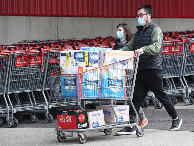 People load up with supplies in Docklands. Picture: David Crosling