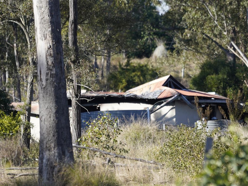 A brick home has been destroyed and a woman hospitalised in a fire that broke out in the rental property on Bullcamp Road in East Nanango on Thursday morning, July 18.