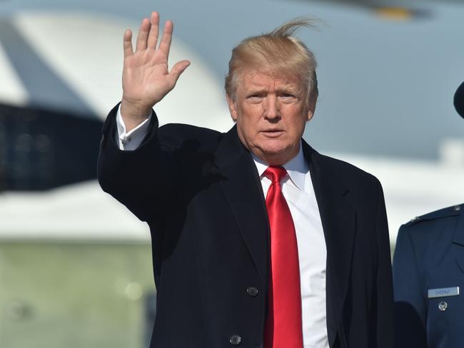 US President Donald Trump arrives at Joint Base Andrews in Maryland as he travels to Missouri to speak on tax reform on Wednesday. Picture: AFP/Nicholas Kamm