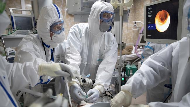 Doctors work on a patient an intensive care at Moscow’s Filatov City Clinical Hospital. Picture: AP