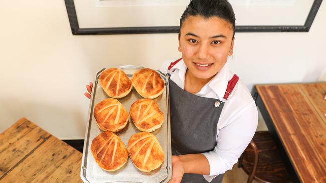 Muna Shrestha and the new season's scallops pies in Battery Point's bakery