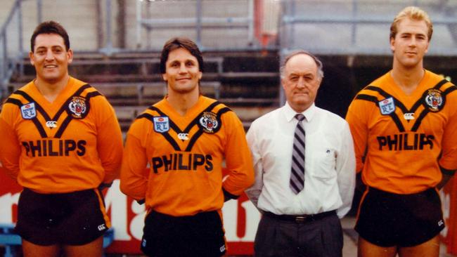 Club sceretary Keith Barnes with 1989 Balmain players (L-R) Gary Jack, Russell Gartner, Steve Roach, captain Wayne Pearce, Paul Sironen and David Brooks at Leichhardt Oval in Sydney. Picture: Ross Schultz