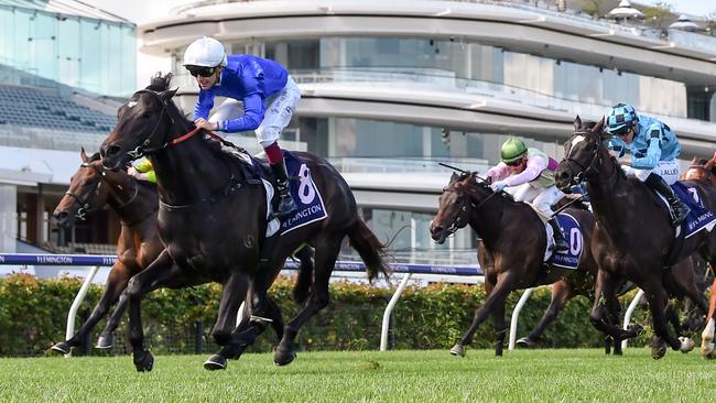 Talented three-year-old Kallos (blue, white cap) has been well-supported first-up at Randwick on Saturday. Picture: Getty Images