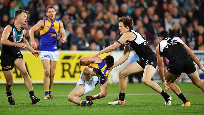 The moment Jared Polec captures Luke Shuey high on Saturday night, resulting in a goal after the extra-time siren. Picture: Daniel Kalisz/Getty Images