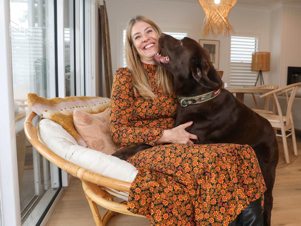 Ali Lowe with Labrador terror Sunny. Photo by Renee Nowytarger / At Home