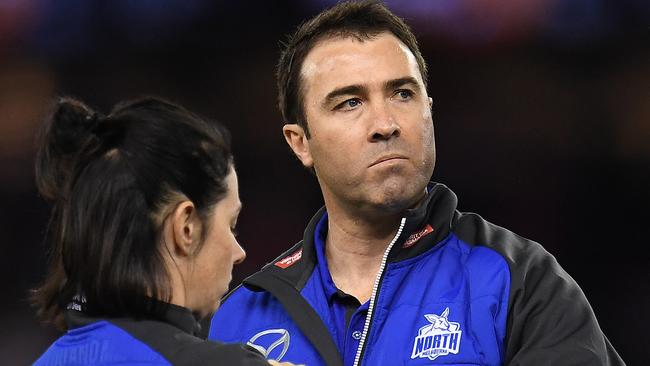 Brad Scott ponders his next move during a quarter-time break.