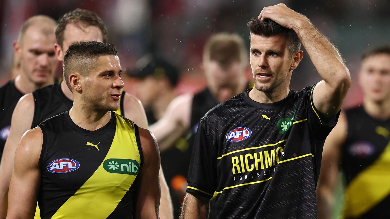 Richmond’s Dion Prestia and Trent Cotchin walk off the Adelaide Oval. Pic: Michael Klein