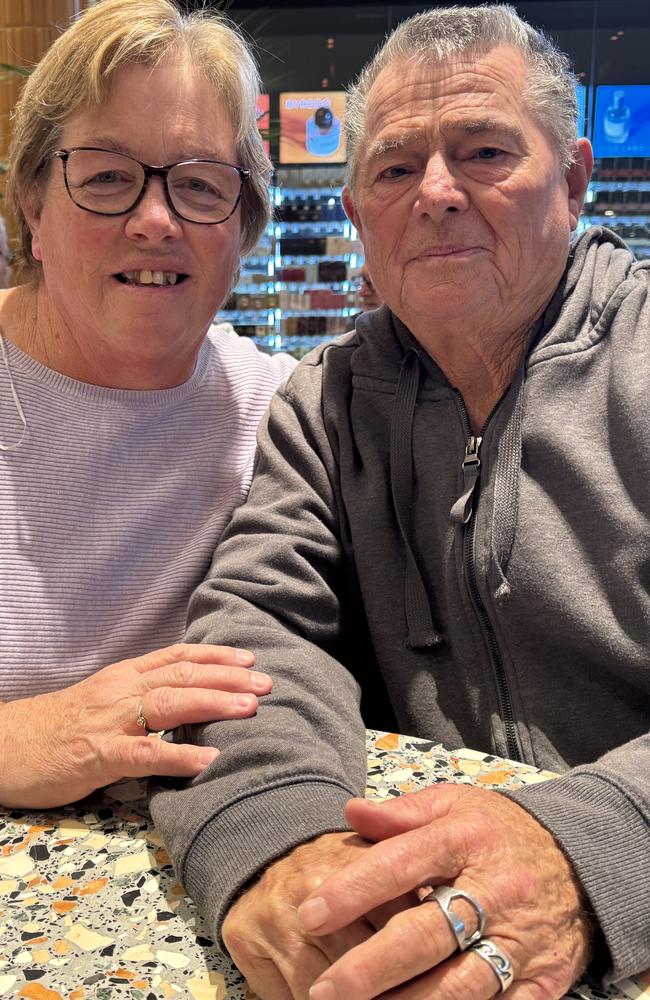 In good spirits: Rod Young with his wife Robyn on Wednesday.