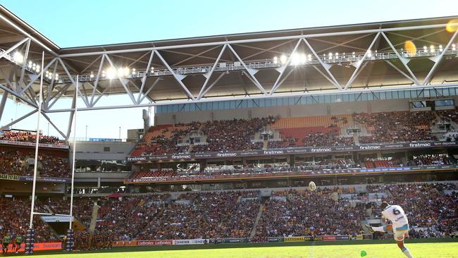 BRISBANE, AUSTRALIA - JUNE 09: Tyrone Roberts of the Titans kicks a goal during the round 13 NRL match between the Brisbane Broncos and the Gold Coast Titans at Suncorp Stadium on June 09, 2019 in Brisbane, Australia. (Photo by Jono Searle/Getty Images)