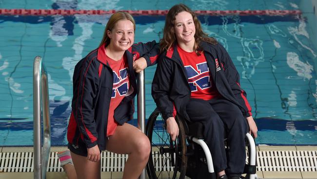 Isabella ‘Izzy’ Vincent (right) with Norwood Swimming Club teammate Emily White. Picture: Naomi Jellicoe