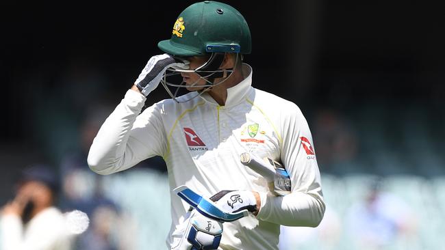 Peter Handscomb departs after being dismissed by James Anderson.