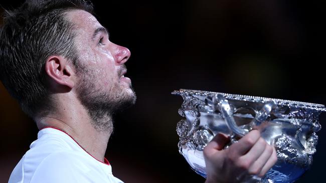 Stan Wawrinka holds the Norman Brookes Challenge Cup after winning the Australian Open final against Rafael Nadal in 2014 Picture: Getty Images