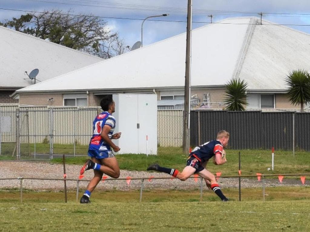 Nick Carrie scoring a try at Toowoomba for the Warwick U19s (Supplied: Dee Carrie)