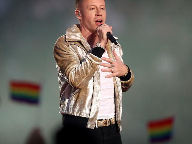 US hip-hop artist Macklemore waved the flag for equality by performing his gay anthem at the 2017 NRL Grand Final in Sydney on Sunday. Picture: Brett Costello