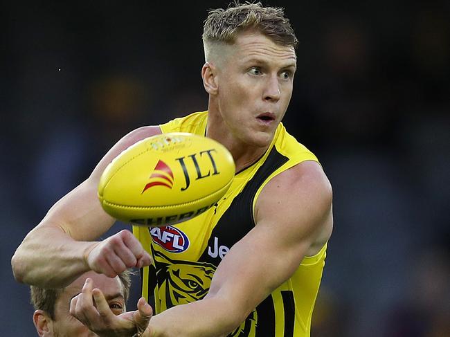 JLT Pre Season match. Richmond V Adelaide at Etihad Stadium. Josh Caddy clears by hand .Pic : Michael Klein