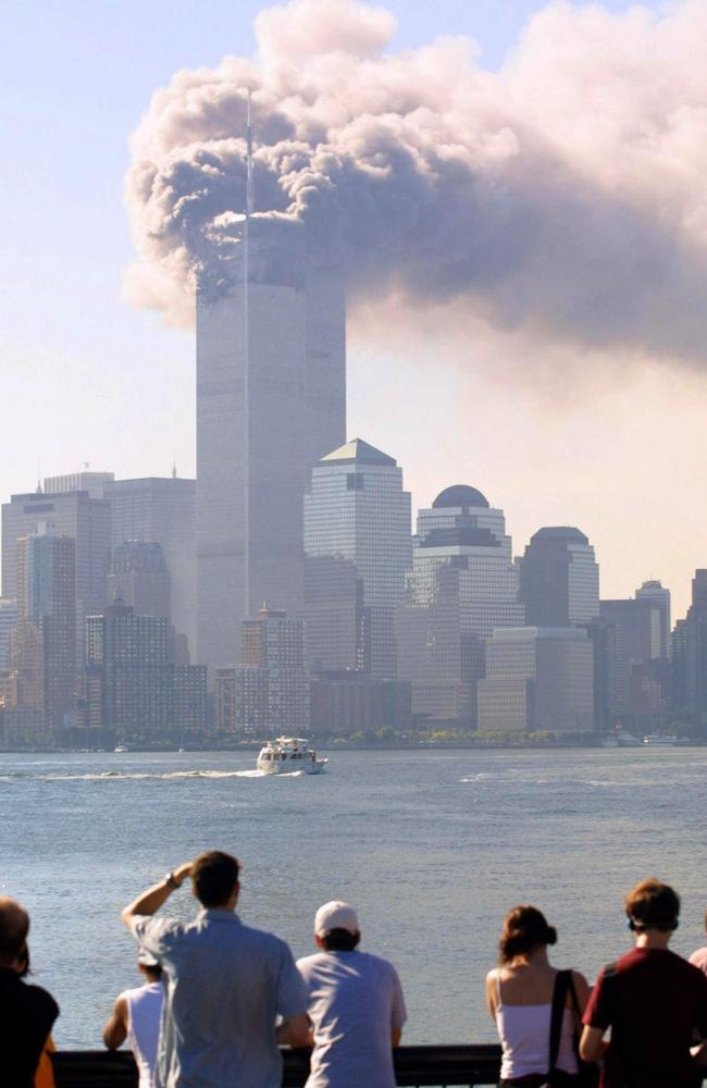 People watching smoke from burning twin towers across Hudson River in New Jersey. Picture: AFP