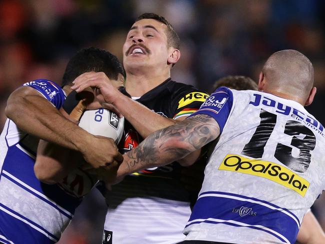 SYDNEY, AUSTRALIA - JULY 27:  Reagan Campbell-Gillard of the Panthers is tackled during the round 21 NRL match between the Penrith Panthers and the Canterbury Bulldogs at Pepper Stadium on July 27, 2017 in Sydney, Australia.  (Photo by Matt King/Getty Images)