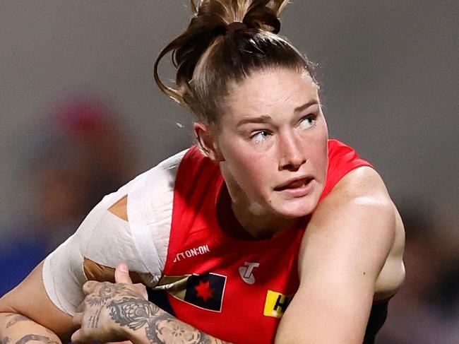 MELBOURNE, AUSTRALIA - SEPTEMBER 01: Tayla Harris of the Demons kicks the ball during the 2023 AFLW Round 01 match between the Melbourne Demons and the Collingwood Magpies at IKON Park on September 01, 2023 in Melbourne, Australia. (Photo by Michael Willson/AFL Photos via Getty Images)