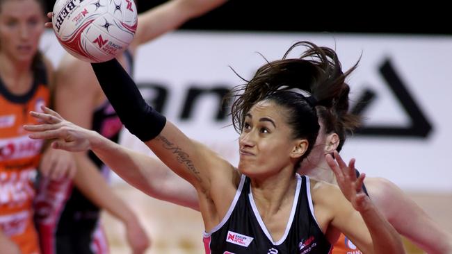 Maria Folau of the Thunderbirds under pressure. Picture: AAP Image/Kelly Barnes