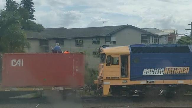 Blockade Australia’s Sharon atop a freight train in Marrickville before being arrested.