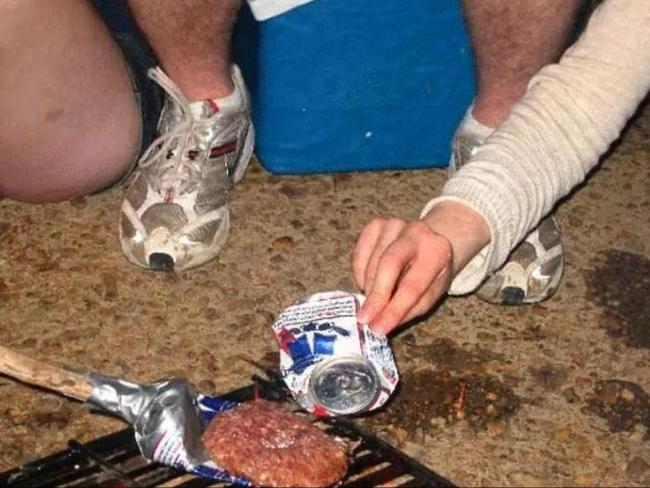 Is this the most depressing barbecue in the world? These holiday-makers forgot their cooking utensils at home, so decided to use crushed beer cans instead.
