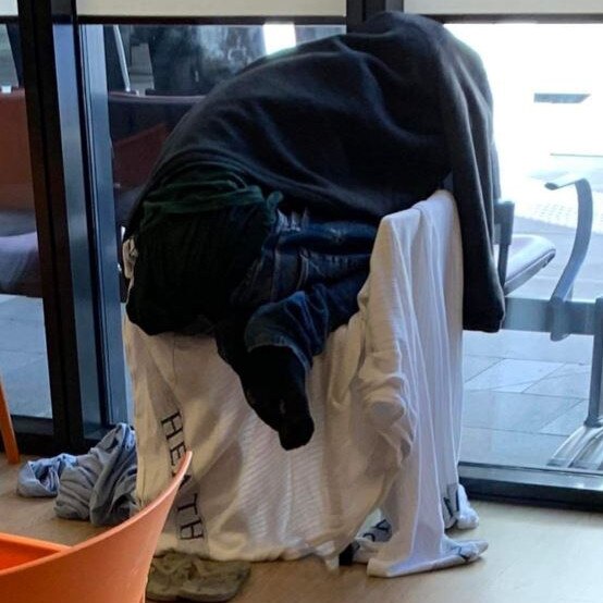 A patient sleeping on a chair in the Gold Coast University Hospital Emergency Department. Picture: Supplied