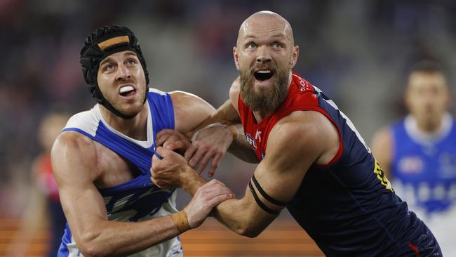 MELBOURNE, AUSTRALIAÃ June 22 , 2024.  AFL Round 15. Melbourne vs North Melbourne at the MCG.   Max Gawn of the Demons and Tristan Xerri of the Kangaroos battle in the ruck    . Pic: Michael Klein