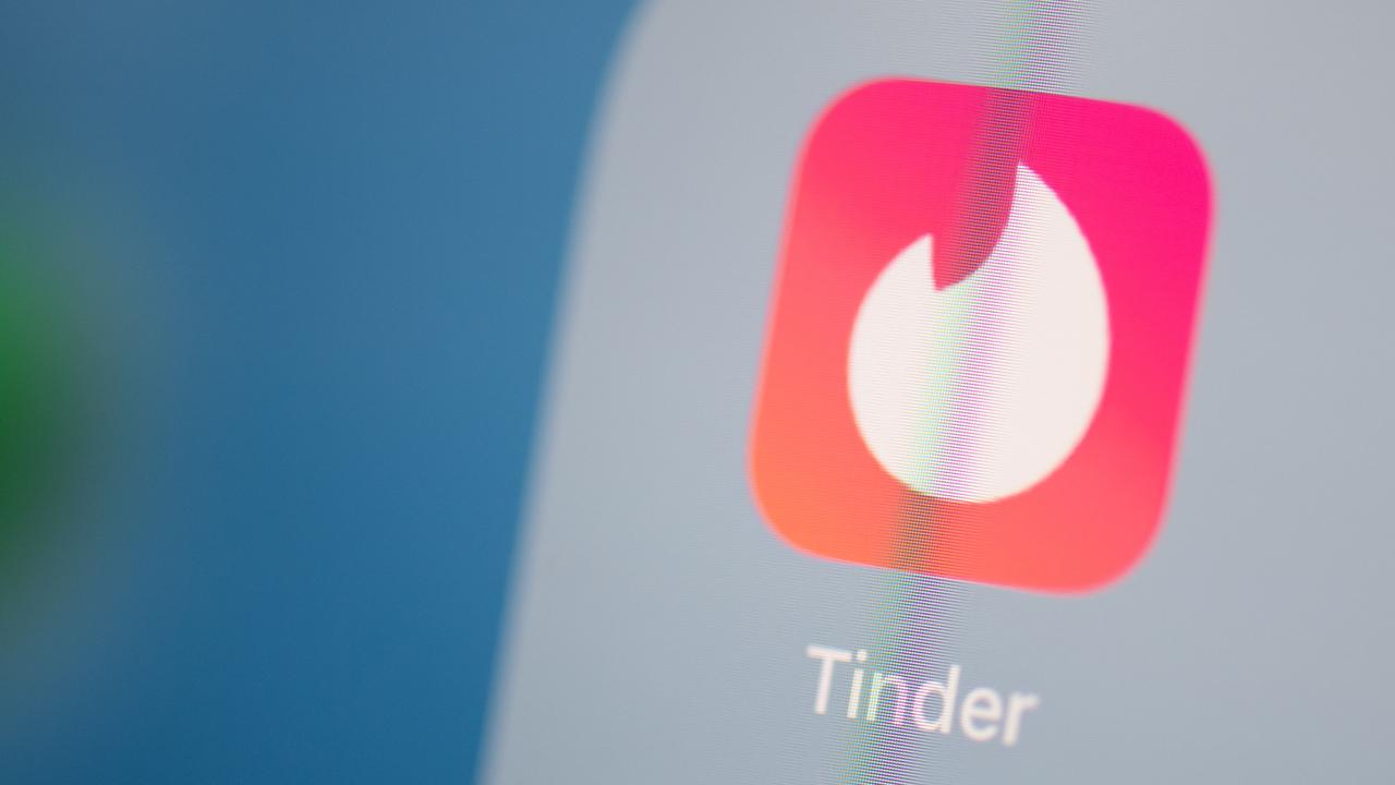 Tinder has released its latest safety feature. Picture: Martin BUREAU / AFP