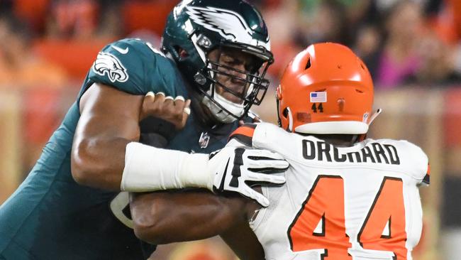 The Philadelphia Eagles’ Jordan Mailata engages Nate Orchard of the Cleveland Browns during a pre-season game last month. Picture: Getty Images