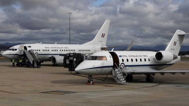 RAAF VIP jets 737 BBJ, left, and Challenger, right, prepare for departures from RAAF Fairbairn in Canberra.