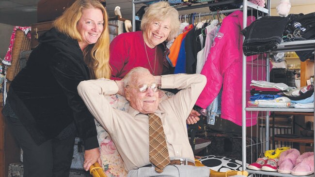 101-year-old Merton Cooke puts his feet up, with his granddaughter Jackie Sims  and daughter Lesley Sims.