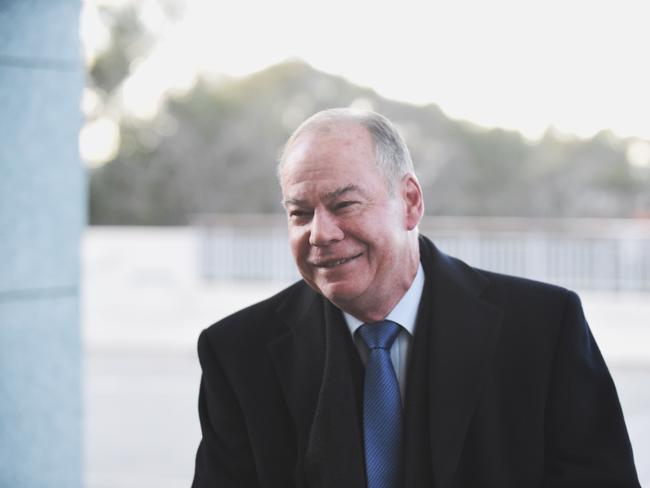 Federal Liberal MP Russell Broadbent arrives through the House of Representatives doors at Parliament House in Canberra, Monday, Aug. 10, 2015. The Parliament will choose a new Speaker on Monday to replace Bronwyn Bishop following her resignation over the travel expenses scandals. (AAP Image/Mick Tsikas) NO ARCHIVING