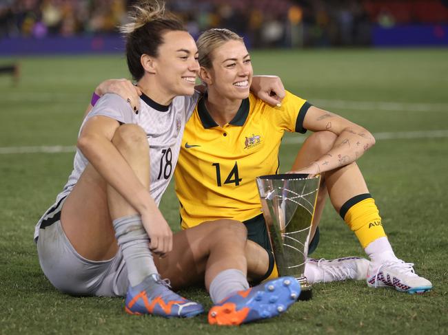 Mackenzie Arnold and Alanna Kennedy celebrate after winning the Cup of Nations. Picture: Scott Gardiner/Getty Images