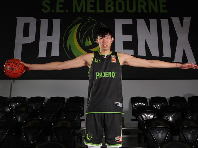 Chinese big man Zhou Qi poses for a portrait during a South East Melbourne Phoenix NBL training session. Photo: Kelly Defina/Getty Images.